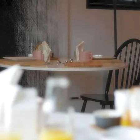 Alojamento de Acomodação e Pequeno-almoço La Maison Dans Les Bois